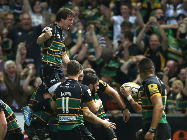 Tom Wood of Northampton Saints celebrates after scoring the last minute match winning try during the Aviva Premiership semi final match between Northampton Saints and Leicester Tigers at Franklin's Gardens on May 16, 2014