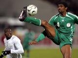Former Arsenal striker Nwankwo Kanu in action for Nigeria on January 31, 2006.