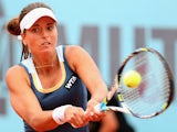 Petra Cetkovska of the Czech Republic plays a forehand against Sloane Stephens of the United States in their second round match during day four of the Mutua Madrid Open on May 6, 2014