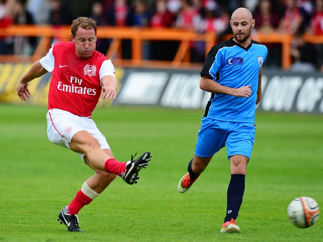 Ray Parlour of Arsenal Legends XI shoots at goal during the charity football match between Arsenal Legends XI and World Refugee Internally Displaced Persons (IDP) XI at Underhill Stadium on June 23, 2013