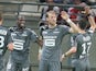 Rennes' teammates celebrate after Rennes' forward Ola Toivonen (2nd R) scores a goal during the French L1 football match between Reims and Rennes, on May 17, 2014