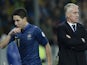 France's midfielder Samir Nasri (L) leaves the pitch next to France's head coach Didier Deschamps during the FIFA World Cup 2014 qualifying football match Ukraine vs France on November 15, 2013