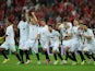 Sevilla players celebrate after Kevin Gameiro of Sevilla (not pictured) scores the winning penalty in the shoot out during the UEFA Europa League Final match on May 14, 2014