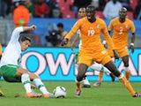 Ivory Coast midfielder Yaya Toure battles for possession with Cristiano Ronaldo on June 15, 2010.