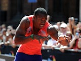 Yohan Blake of Jamaica celebrates winning the Men's 150 Metres during the Great City Games In Manchester on May 17, 2014