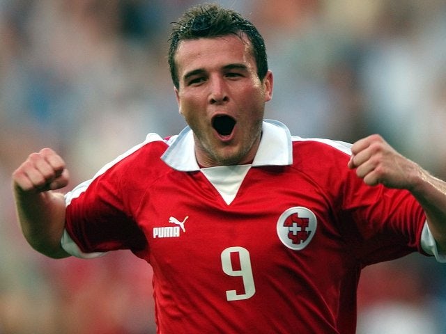 Switzerland striker Alexander Frei celebrates scoring against Russia on June 07, 2003.