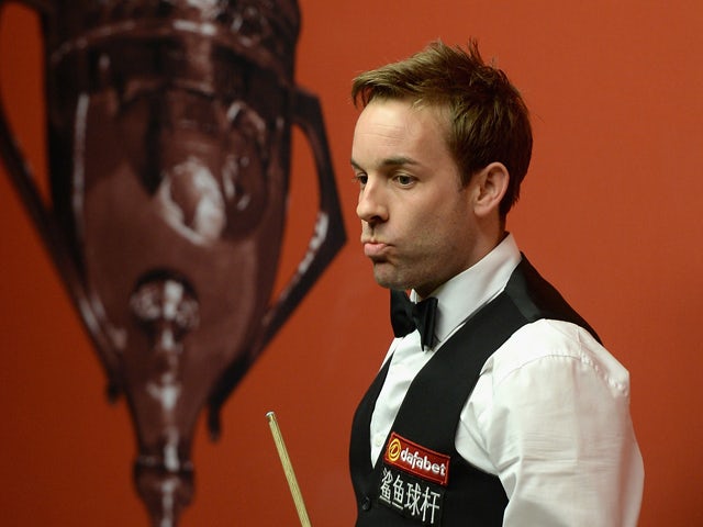 Ali Carter in action against Mark Selby during the second round of The Dafabet World Snooker Championship at Crucible Theatre on April 25, 2014