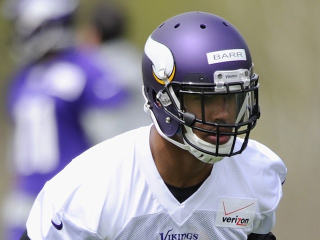 Anthony Barr #55 of the Minnesota Vikings runs a drill during rookie minicamp on May 16, 2014