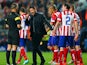  Diego Simeone, Coach of Club Atletico de Madrid speaks to Referee Bjorn Kuipers during the UEFA Champions League Final between Real Madrid and Atletico de Madrid at Estadio da Luz on May 24, 2014