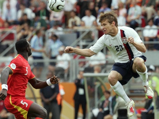 USA striker Brian McBride leaps to head the ball against Ghana on June 22, 2006.