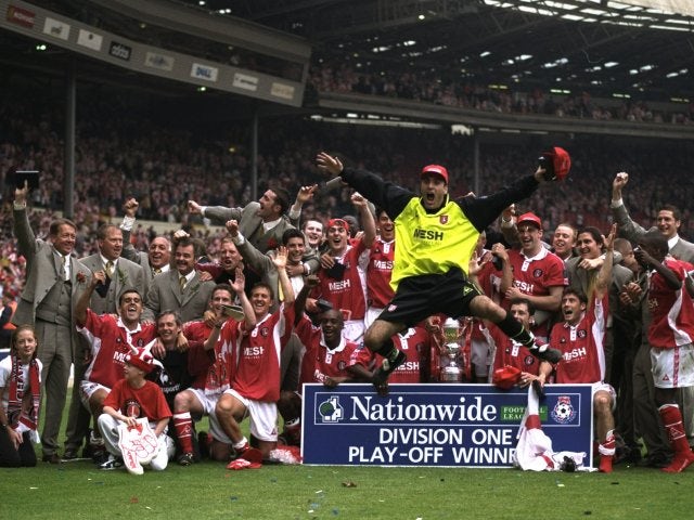 Charlton Athletic players celebrate earning promotion to the Premier League at Wembley on May 25, 1998.