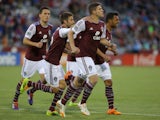 Dillon Powers #8 of the Colorado Rapids celebrates as he scores a goal on a penalty kick against the the Montreal Impact in the fifth minute at Dick's Sporting Goods Park on May 24, 2014