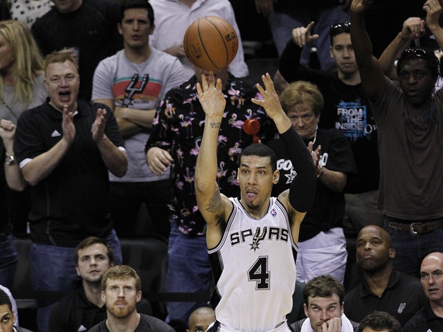 Danny Green #4 of the San Antonio Spurs shoots a three point shot against the Oklahoma City Thunder in Game Two of the Western Conference Finals during the 2014 NBA Playoffs at the AT&T Center on May 21, 2014