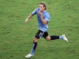Former Manchester United striker Diego Forlan celebrates scoring Uruguay on July 07, 2007.