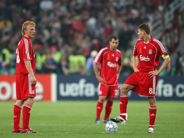 Dirk Kuyt and Steven Gerrard of Liverpool prepare to re-start following the the first goal by Milan during the UEFA Champions League Final match on May 23, 2007