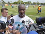 Ja'Wuan James #72 of the Miami Dolphins answers questions from the media after the rookie minicamp on May 23, 2014