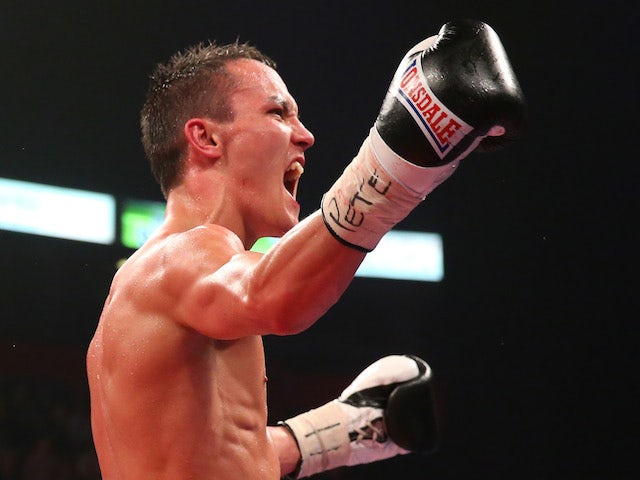 Josh Warrington celebrates after stopping Rendall Munroe during the Commonwealth Featherweight Title fight on April 19, 2014