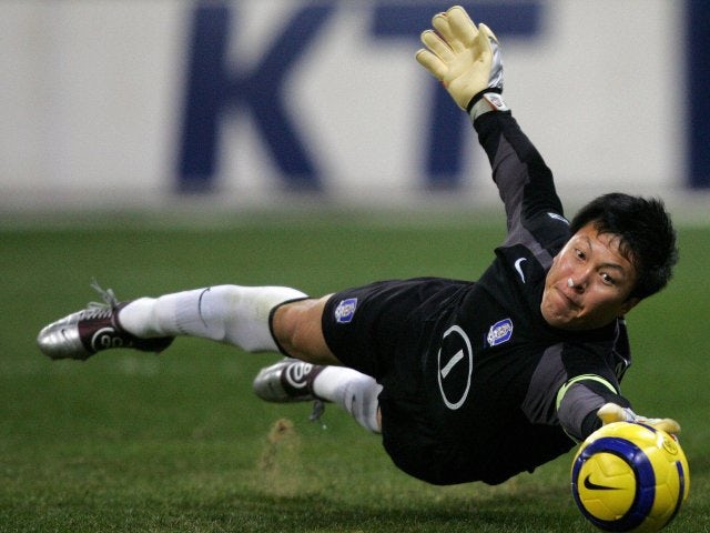 South Korea goalkeeper Lee Woon-jae makes a save on December 19, 2004.