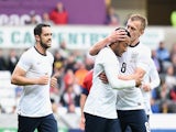 Nathan Redmond of England is congratulated on scoring the first goal during the 2015 UEFA European U21 Championships Qualifier against Wales on May 19, 2014