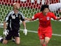 Former Manchester United midfielder Park Ji-sung celebrates scoring for South Korea against France on June 18, 2006.