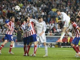 Real Madrid's defender Sergio Ramos scores during the UEFA Champions League Final Real Madrid vs Atletico de Madrid at Luz stadium in Lisbon, on May 24, 2014