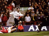 Manchester United's Ryan Giggs lashes a shot past Arsenal goalkeeper David Seaman on April 14, 1999.