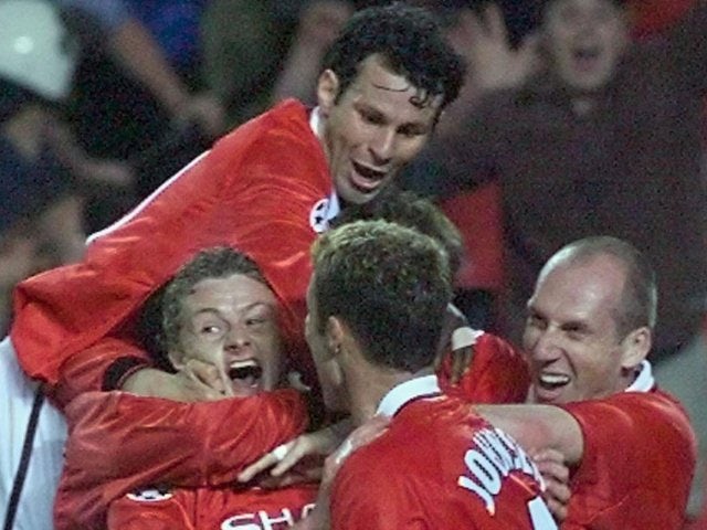 Ryan Giggs, Ole Gunnar Solskjaer and Manchester United teammates celebrate the latter's goal in the Champions League final on May 25, 1999.