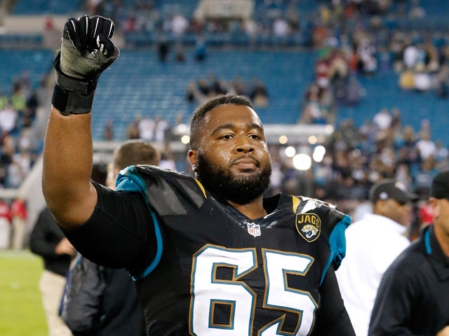 Will Rackley #65 of the Jacksonville Jaguars celebrates following a victory over the Houston Texans at EverBank Field on December 5, 2013