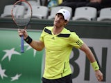 Great Britain's Andy Murray reacts during his French tennis Open third round match against Germany's Philipp Kohlschreiber at the Roland Garros stadium in Paris on May 31, 2014