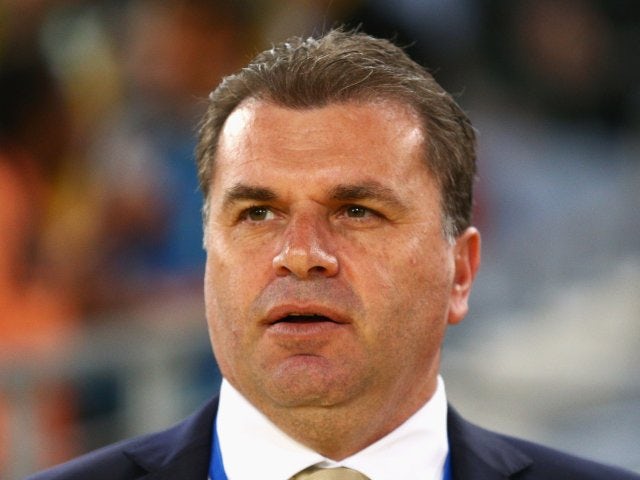 Australia coach Ange Postecoglou stands on the touchline during his side's match against South Africa on May 26, 2014.