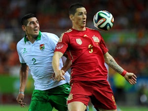 Torres, Iniesta strikes hand Spain win