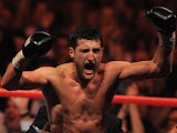 Carl Froch of Britain celebrates after beating Lucian Bute of Romania during their IBF World Super Middleweight Title boxing match in Nottingham central England on May 26, 2012