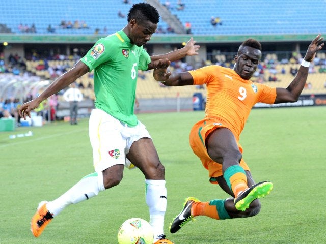 Newcastle United midfielder Cheick Tiote performs a slide tackle while on international duty with Ivory Coast on January 22, 2013.