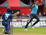 England's Chris Jordan celebrates after taking the wicket of Sri Lanka's Dinesh Chandimal during the third One Day International (ODI) cricket match between England and Sri Lanka at Old Trafford, northwest England, on May 28, 2014