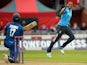 England's Chris Jordan celebrates after taking the wicket of Sri Lanka's Dinesh Chandimal during the third One Day International (ODI) cricket match between England and Sri Lanka at Old Trafford, northwest England, on May 28, 2014