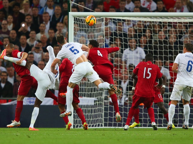 Gary Cahill of England heads in their second goal during the international friendly match between England and Peru at Wembley Stadium on May 30, 2014