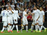 England players celebrate during the international friendly against Peru at Wembley on May 30, 2014