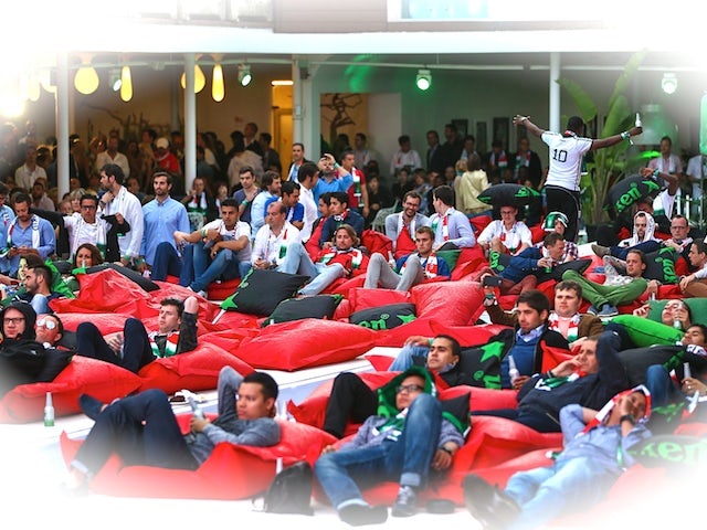 Guests watch on at the Ushuaia Beach Hotel during the Heineken Ibiza Final on May 24, 2014