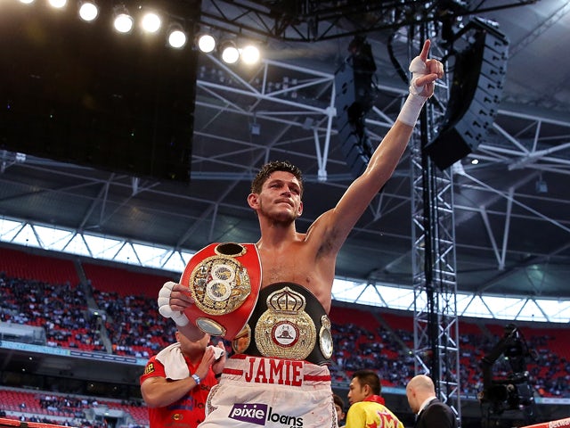 Jamie McDonnell celebrates his victory over Tabttimdaeng Na Rachawat during their WBA World Bantamweight Championship bout at Wembley Stadium on May 31, 2014