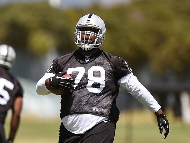 Justin Ellis #78 of the Oakland Raiders participates in drills during Rookie Minicamp on May 16, 2014