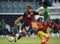Germany's midfielder Mario Gotze (L) and Cameroon's defender Nicolas Nkoulou vie for the ball during the friendly football match on June 1, 2014