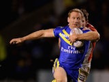 Michael Monaghan of Warrington Wolves in action during the Super League match between Warrington Wolves and St Helens at The Halliwell Jones Stadium on February 13, 2014