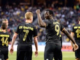 Belgium's forward Romelo Lukaku (2nd-R) celebrates after scoring a goal during the friendly football match between Sweden and Belgium at Friends Arena in Solna, near Stockholm on June 1, 2014