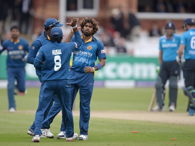 Lasith Malinga of Sri Lanka celebrates dismissing Jos Buttler of England during the 4th Royal London One Day International match between England and Sri Lanka at Lord's Cricket Ground on May 31, 2014