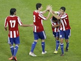 Paraguay's midfielder Victor Caceres celebrates after scoring a goal during the international friendly football match France vs Paraguay, on June 01, 2014
