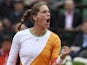 Germany's Andrea Petkovic celebrates after winning a point during her French Open quarter-final against Italy's Sara Errani at the Roland Garros in Paris on June 4, 2014
