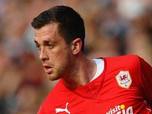 Wigan complete Taylor signing