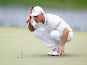Ben Crane lines up a putt on the 18th green during the second round of the FedEx St. Jude Classic at the TPC Southwind on June 6, 2014