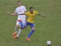 Serbia's footballer Nemanja Matic vies for the ball with Brazil's Neymar during a friendly match ahead of the upcoming Brazil 2014 FIFA World Cup, at Morumbi stadium in Sao Paulo, Brazil, on June 6, 2014