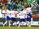 Bruno Alves #2 of Portugal celebrates his goal with teammates in the final seconds of extra time in the second half against Mexico on June 7, 2014